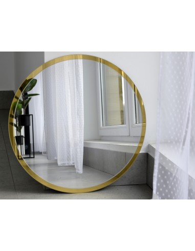Okrúhle zrkadlo v ráme so zlatým...