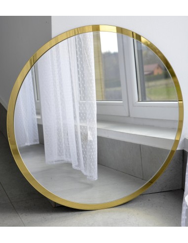 Okrúhle zrkadlo v ráme so zlatým...