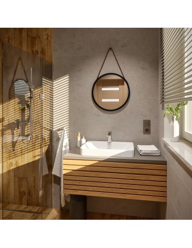 Okrúhle zrkadlo v čiernom matnom ráme...